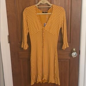 Yellow polka dot mini dress